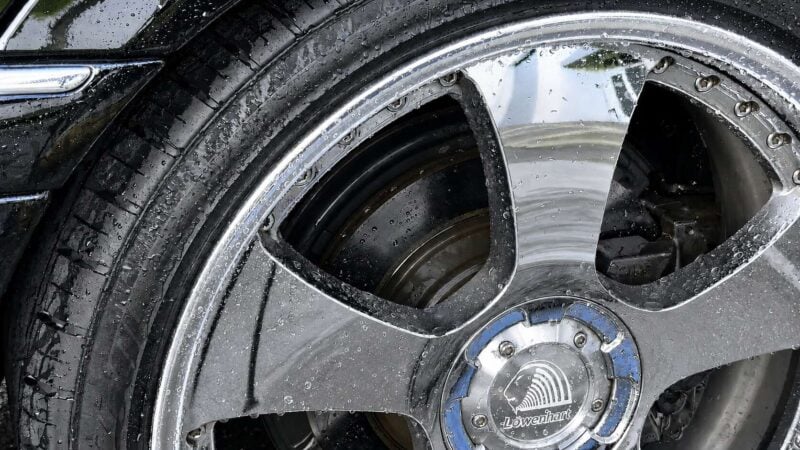 Mike Phillips demonstrating Dr. Beasley’s Wheel Detailer on a car wheel using the Spray & Wipe and Spray & Rinse methods
