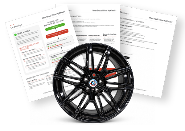 Preview of the three-page guide explaining when to clean wheels, with a black BMW wheel.